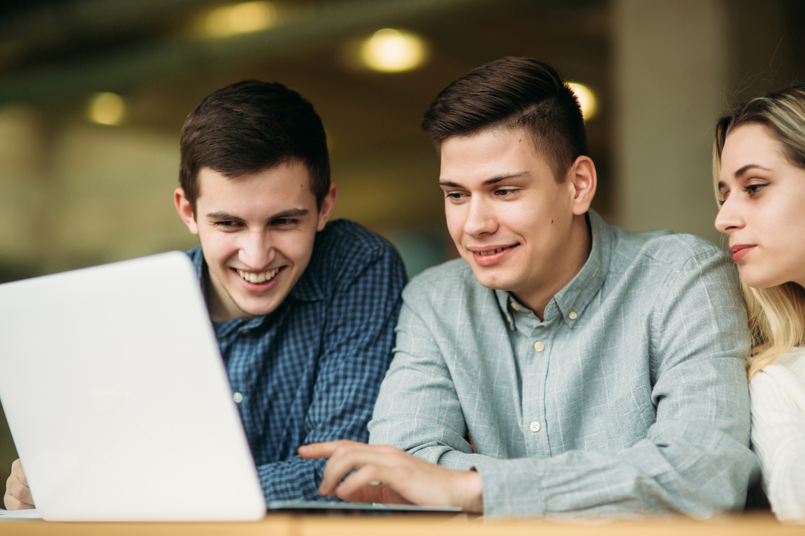 College Students with Laptop Studying Together